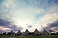 sunset over wedding marquees in swindon elizabeth donovan photography