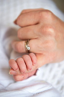 mum and baby holding hands Baby photo shoot in the home natural photography with little one family lifestyle swindon wiltshire