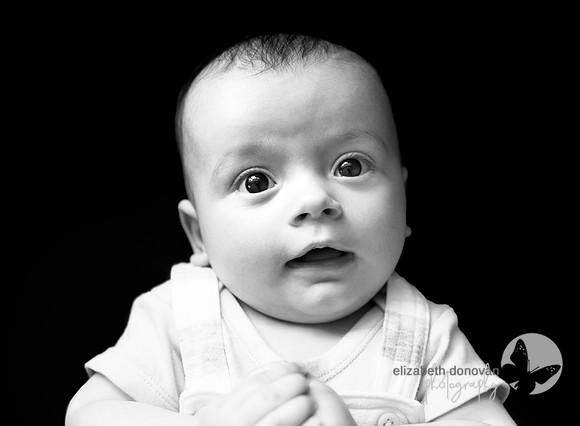 baby saying hello Baby photo shoot in the home natural photography with little one family lifestyle swindon wiltshire