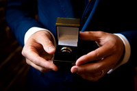 wedding rings held by the best man at wellington barn elizabeth donovan photography