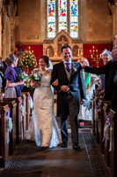 elizabeth donovan photography  bride and groom walking out of broad hinton church