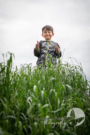 cheeky childrens portait relaxed outdoor family portrait in swindon elizabeth donovan photography cute children portrait