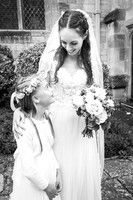 sweet bride and her bridesmaid looking at each other elizabeth donovan photography  wiltshire