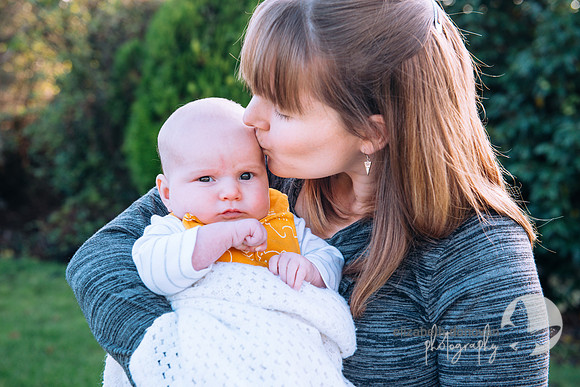 beautiful photograph of mother and baby outdoors in relaxed photo shoot at home in swindon wiltshire