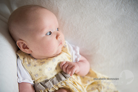 soft relaxed baby girl gentle Baby photo shoot in the home natural photography with little one family lifestyle swindon wiltshire