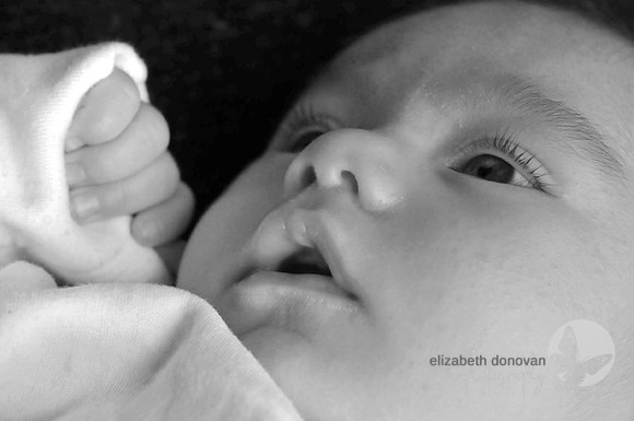 close up of baby face Baby photo shoot in the home natural photography with little one family lifestyle swindon wiltshire